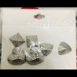 Package of silver coded earrings brand new